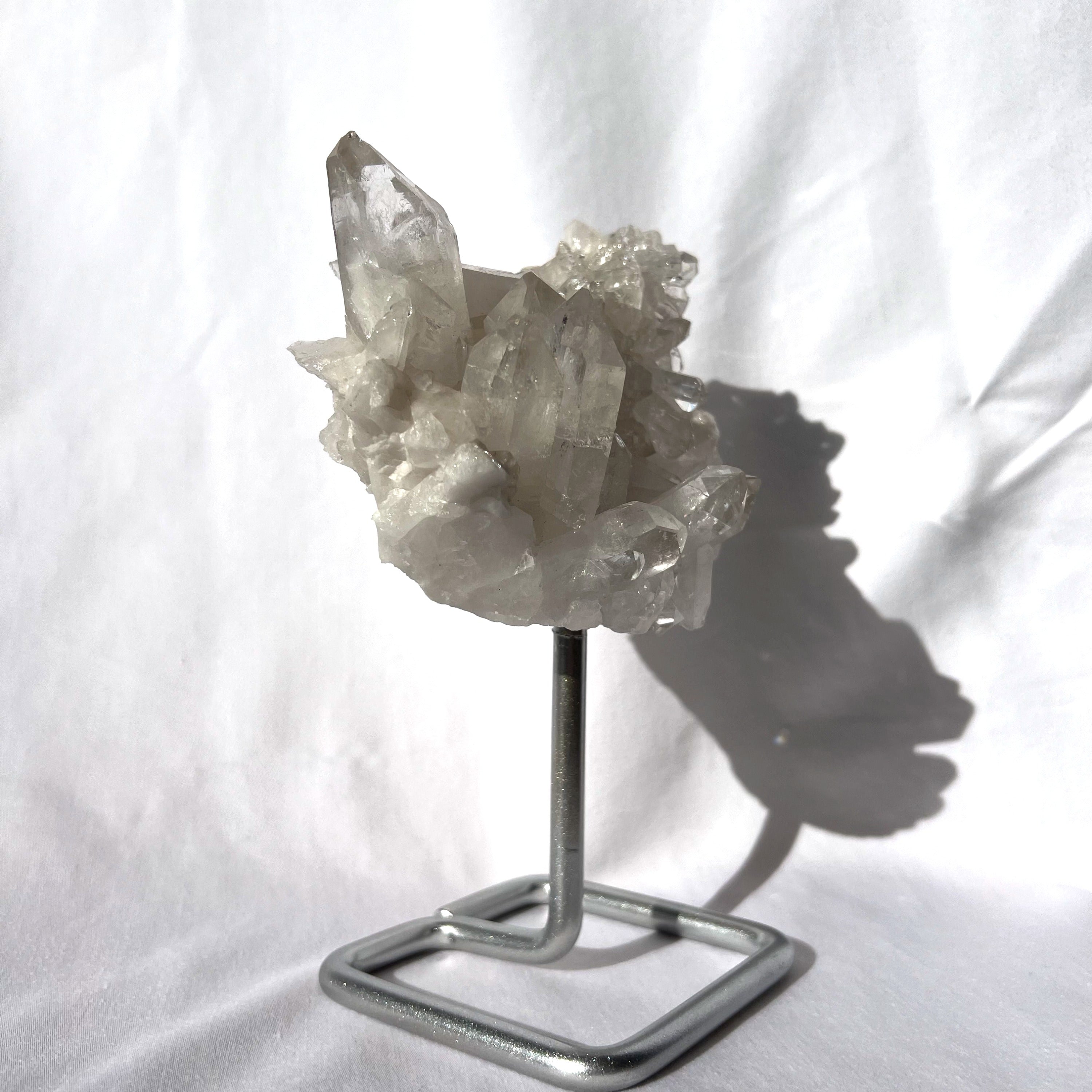 Clear Quartz Cluster on Silver Stand