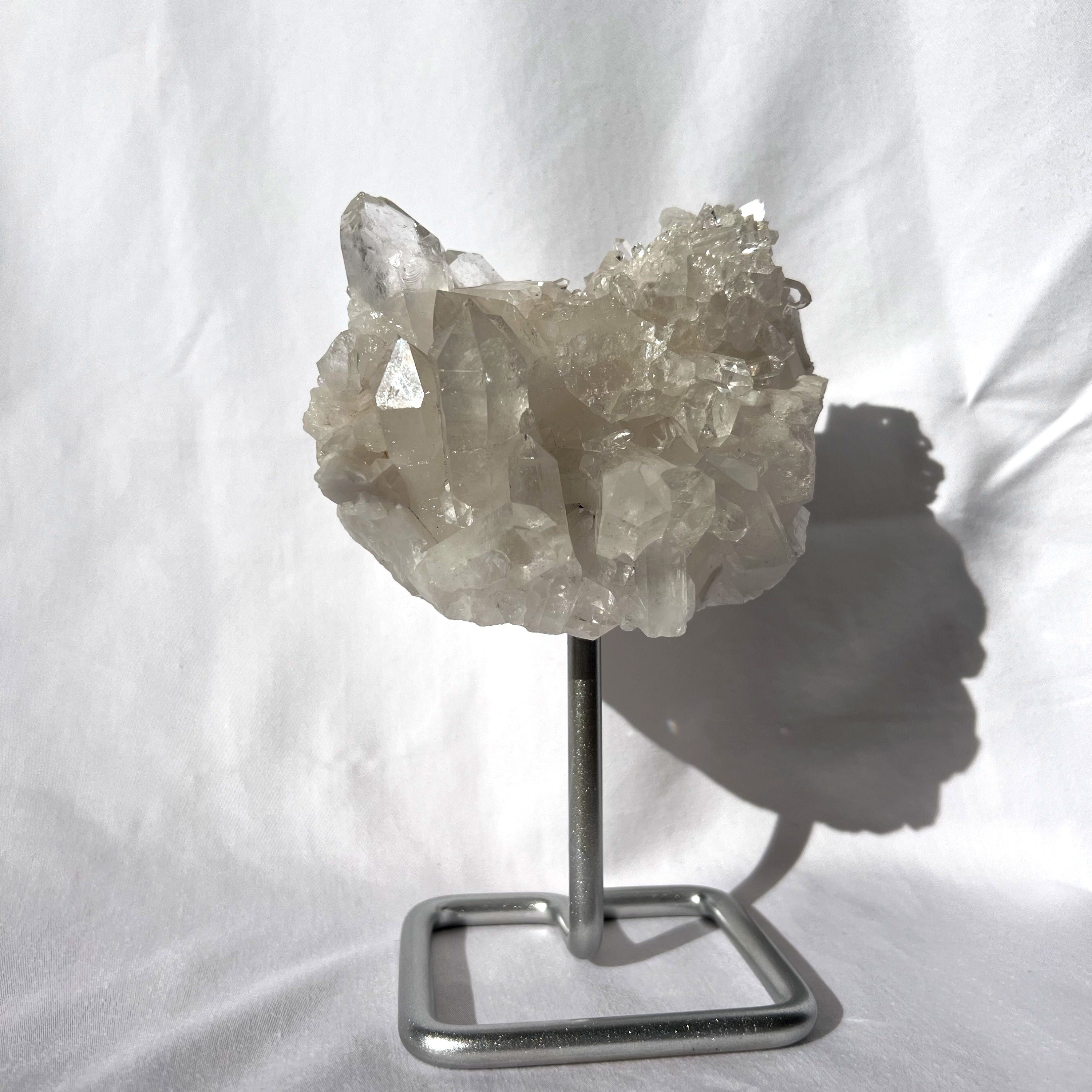 Clear Quartz Cluster on Silver Stand