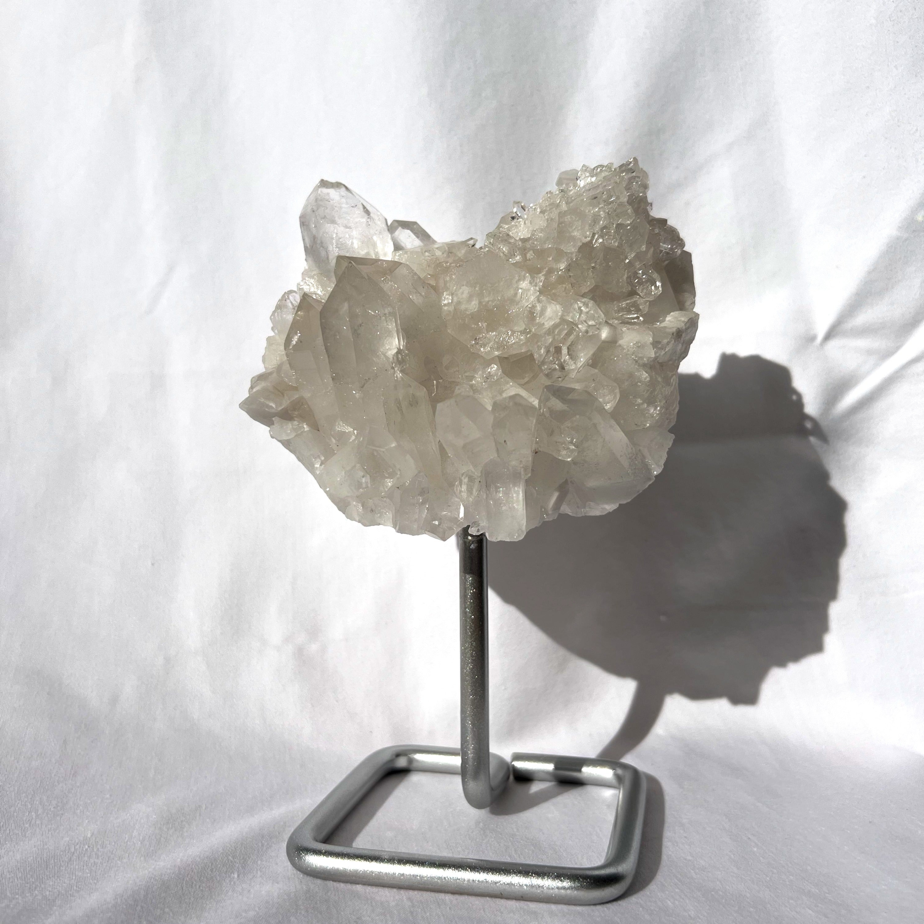 Clear Quartz Cluster on Silver Stand