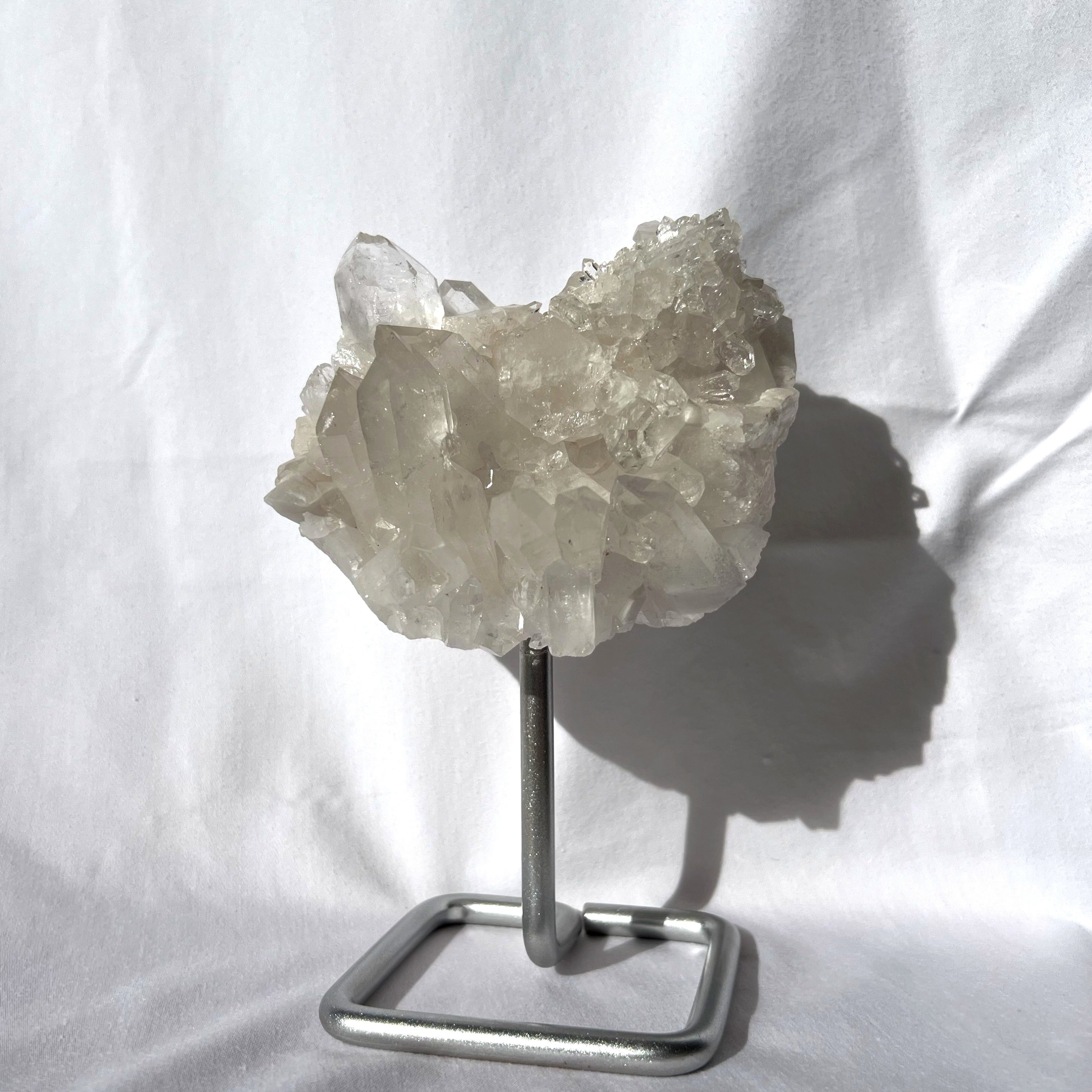 Clear Quartz Cluster on Silver Stand
